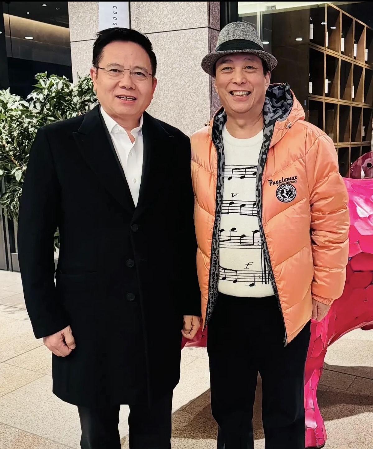 日中文化国际交流协会黄会长与李山先生合影